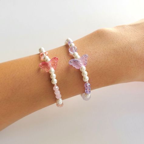 Butterfly Bracelet Beads, Purple Bracelet Ideas, Kdrama Jewelry, Butterfly Bead Bracelet, Customize Bracelet, Nevertheless Kdrama, Pink Purple Butterfly, Butterfly Bracelets, Bentuk Alis