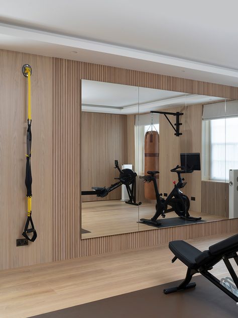 Cadogan Home Gym - Paragon Studio Home Gym Locker Room, Home Gym Mirror Wall With Tv, Exercise Room Paint Colors Home Gyms, Garage Gym Door, Small Bedroom Gym Ideas, Aesthetic Home Gym Ideas, Wellness Home Aesthetic, Home Gym With Tv, Ikea Home Gym