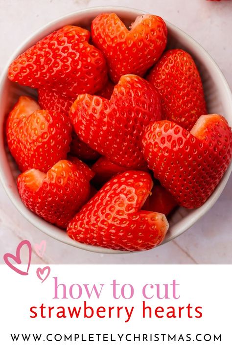 Heart shaped strawberries are a great way to add a touch of sweetness and fun this Valentine's Day. They're so easy and you can use them in a variety of ways. You can slice them and add them to a salad, layer them on top of a delicious dessert, or even just enjoy them as is with a little bit of whipped cream. They're so adorable and take just a few minutes to make! #valentinesday #DIY Strawberry Heart Cupcakes, Chocolate Covered Strawberry Hearts, Cake Made Out Of Fruit Diy, Cut Strawberries Into Hearts, Heart Shape Strawberries, Strawberry Board Ideas, Strawberry Treats For Kids, Strawberry Hearts How To Cut, How To Cut Strawberries Into Hearts