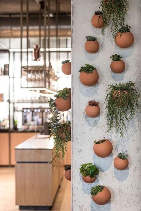 43 Wall Art Decor Ideas to Level Up Your Home Cafe Plants Interiors, Green Cafe Design, Cafe Bistro Design, Caffe Decoration, Resturant Ideas Design Interiors, Creative Cafe Interior, Install Floating Shelves, Cafe Plants, Bohemian Cafe