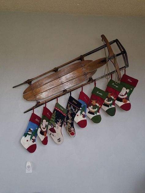 This was a great solution to hang stockings. No mantle no problem and a great use of an heirloom! Stocking Holder No Fireplace, Christmas Stocking Wall Decor, Where To Hang Stockings If No Fireplace, Hanging Christmas Stockings No Fireplace, Stocking Display No Mantle, Hang Stockings Without Fireplace, Stockings No Mantle, Christmas Stocking Hanging Ideas, Stocking Hanging Ideas No Fireplace