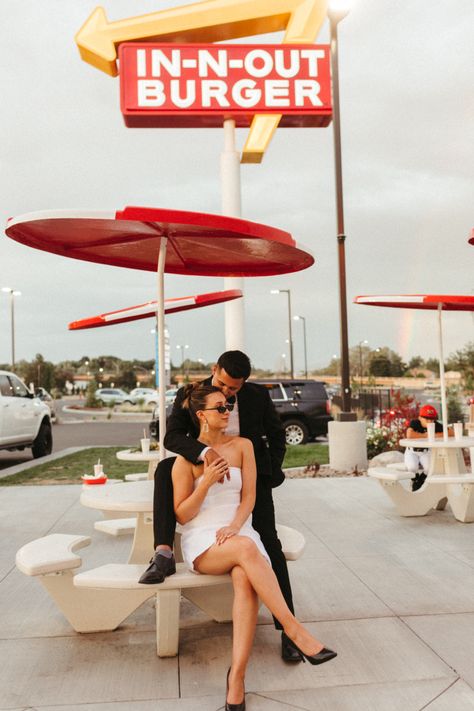 Elopement style photoshoot at in n out | cute couples photo idea Las Vegas, Los Angeles, In N Out Photoshoot Ideas, 80s Engagement Photoshoot, Burger Engagement Photos, Steak And Shake Photoshoot, Mcdonald’s Engagement Shoot, Wedding In N Out, In N Out Couple Photoshoot