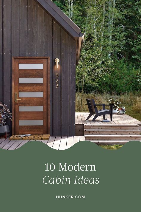 For some, the word "cabin" evokes images of off-the-grid, modest structures located deep in the woods, void of everyday conveniences including running water and electricity. If that's not your idea of a good time, behold modern cabin ideas. #hunkerhome #modern #cabinideas #moderncabin #moderncabinideas Nature, Modern Cabin Backyard, Dream Cabin Exterior, Modern Camp House, Outside Cabin Ideas, Modern Cabin Landscaping, Small Black Cabin, Modern Cabin Front Door, Modern Cabins In The Mountains