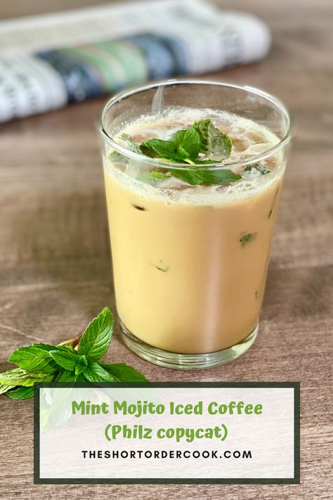 a glass of iced mint coffee on a table with a newspaper and fresh mint sprig Mint Coffee Recipes, Summer Latte Flavors, Peppermint Iced Coffee, Coffee Specials, Plant Bar, Easy Drinks To Make, Mint Shake, Starbucks Peppermint Mocha, Mint Coffee