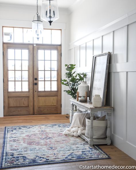 Easily Add Wainscoting in the Entryway Entryway With Wainscotting, Wayne Scotting Walls Entryway, Entry Way Wainscoting, Entryway Wood Paneling, Foyer Wainscoting Entryway, Wainscoting Ideas Entryway, Board And Batten Foyer, Double Wood Front Doors, Wainscoting Entryway