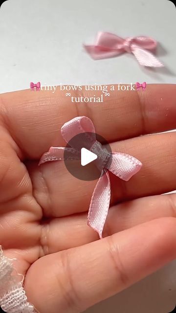 Ever Lasting on Instagram: "How to create the cutest bows? 👀🎀🥹  Materials needed:  ⭐️Fork ⭐️Ribbon or any desired material for the bow  Instructions:  1. Begin by selecting the ribbon you want to use for your bow. Cut a piece of ribbon long enough to create the size of bow you desire. 2. Hold the end of the ribbon against the back of the fork, leaving a small tail to hang down. 3. Wrap the ribbon around the front of the fork and bring it to the back, crossing over the tail you left hanging down. 4. Continue wrapping the ribbon around the fork in the same manner, creating loops on both sides of the fork. 5. Once you’ve wrapped the ribbon around the fork several times and created enough loops for your bow, cut the ribbon, leaving a tail long enough to tie off the bow. 6. Carefully slide t How To Make Bows With A Fork, Fork Ribbon Bow, Make A Bow With A Fork, How To Tie A Small Bow Using A Fork, Diy Small Ribbon Bows, Sew Ribbon On Fabric, Bow From Ribbon Diy, Cute Ribbon Bows, How To Make A Small Bow With Ribbon