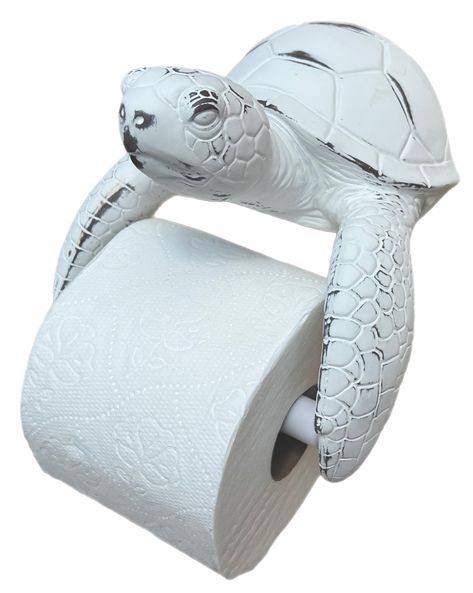 PRICES MAY VARY. SEA TURTLE TOILET PAPER HOLDER - add a touch of coastal charm to your bathroom decor. Ideal for creating a beachside or nautical themed bathroom ambiance. ACCOMMODATES - standard, double and mega rolls. Effortlessly combines style and functionality in one unique piece. MEASURES - 7" (T) x 6 3/4" (W) x 5 1/2" (D). Weighs over 1 pound. CRAFTED from highly detailed resin material for longevity Durable construction ensures it withstands daily use. INCLUDES a built-in flush mount bra Surfboard Room Decor, Beachy Bathroom Decor, Surfboard Room, Bathroom Beach Theme, Key West Decor, Turtle Bathroom, Surf Room Decor, Beach Coastal Decor, Ocean Bathroom