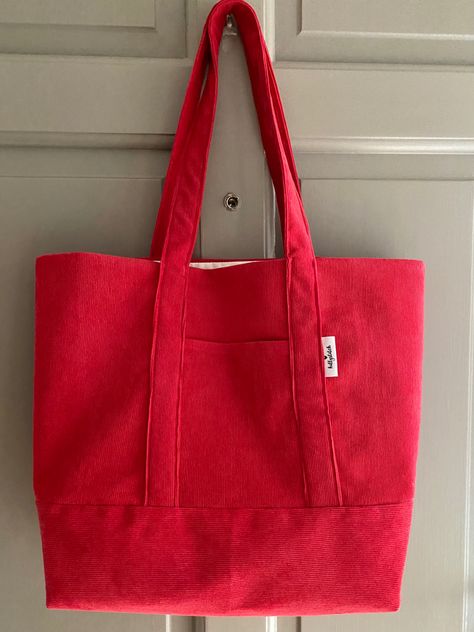 Large red corduroy tote bag with pockets, fully lined in a cream cotton. Pockets front and back Elegant Navy Dress, Felt Turtle, Corduroy Tote Bag, Bag With Pockets, Tote Bag With Pockets, Jeans Bags, Everyday Tote Bag, Red Tote Bag, Red Tote