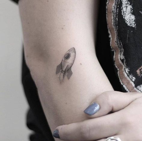 Ship Tattoo Small, Rocket Ship Tattoo, Small Hip Tattoos Women, Atom Tattoo, Spaceship Tattoo, Rocket Tattoo, Hip Tattoo Small, Ufo Tattoo, Astronaut Tattoo