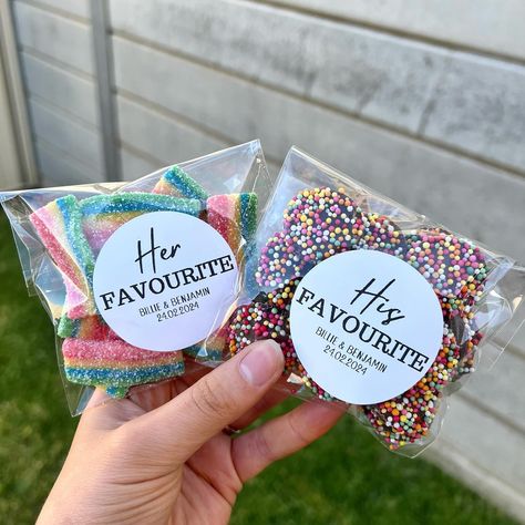 Sharing your favourite sweets as wedding favours 🍬 Repost IG @winnie.and.willa #weddingfavours #sweetgifts #weddinggifts #weddingplanning #weddingbreakfast #weddingsweets #herfavourites #hisfavourites #weddingfavour #weddingideas #weddinginspiration Sweetie Wedding Favours, Tea Wedding Favours, His And Hers Sweets Favours, His And Her Favourite Sweets, Candy Wedding Favours, Wedding Favours Cheap, Food Wedding Favors For Guests, Wedding Gift Bags Ideas, Wedding Savers Ideas