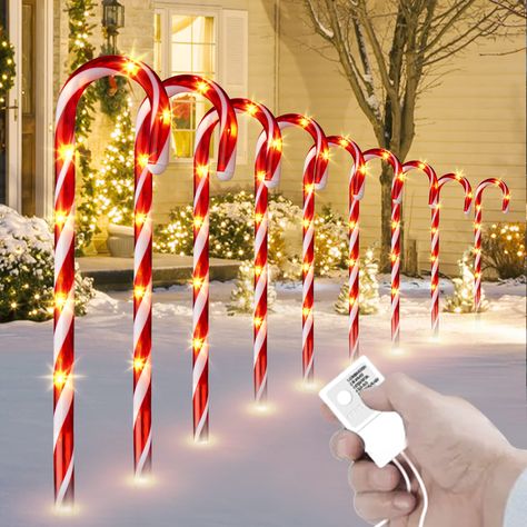 PRICES MAY VARY. 【FUNCTION UPDATE】: Cost-effective to have 8 packs of 9 modes, including Combination, In wave, Sequential, Slo glo, Chasing/Flash, Slow fade, Twinkle/Flash, Steady on, Off. Whole set remains lit-up even one bulb is broken. 【CHRISTMAS CANDY CANE LIGHT】: Set of 8, total length 30.125FT with 13.75FT lighted, 64LT warm white light bulbs, LED spacing 2.75", candy cane spacing 23.625", and lead wire 16.4FT 【CHRISTMAS BEST CHOICE】: Classic Christmas red and white candy cane pathway mark Candy Cane Walkway, Lawn Driveway, Holiday Soiree, White Light Bulbs, Pack Light, Pathway Lighting, White Candy, Garden Lawn, Yard Garden