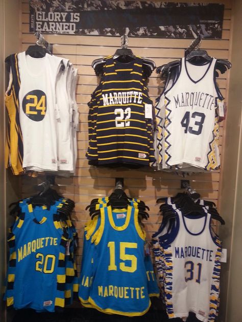 Throwback Marquette Basketball jerseys now available at the Marquette Spirit Shop. Stop in or call 414-288-3050 to order. Marquette Basketball, Ncaa Basketball Jersey, Marquette University, Warriors Basketball, Sports Team Logos, Ncaa Basketball, Basketball Uniforms, Sports Uniforms, Basketball Jerseys