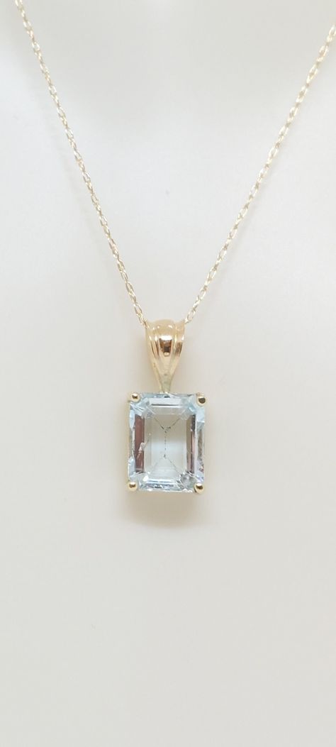 Aquamarine 1.50Ct 14k Yellow Gold Pendant / Necklace. Natural stone. 14k gold Chain necklace. Rectangle Gemstone Jewelry. Aquamarine Lover. March Birthday Stone. Product Info: - Stone: 1.50 Ct 7x5mm Rectangle Aquamarine, - Color: Light Blue. - Pendant Measures: 13mm x 5mm. 1.50Ct - Metal: 14k Yellow Gold. - Chain Length: 18 Inches Rope Chain - Made in USA. - Nice Gift Box Included. Rectangle Stone Earrings, Aquamarine Necklace Pendant, Jewelry Aquamarine, Light Blue Necklace, Birthday Stone, Sentimental Jewellery, March Birthday, Gold Rope Chains, Aquamarine Pendant