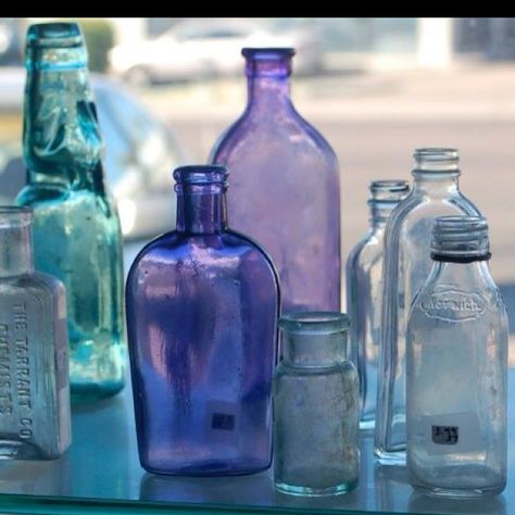 love the colors... Colored Glass Aesthetic, Glass Bottles Aesthetic, Glass Bottle Aesthetic, Colored Bottles, Purple Bottle, Colored Glass Bottles, Old Glass Bottles, Beautiful Bottles, Blue Glass Bottles