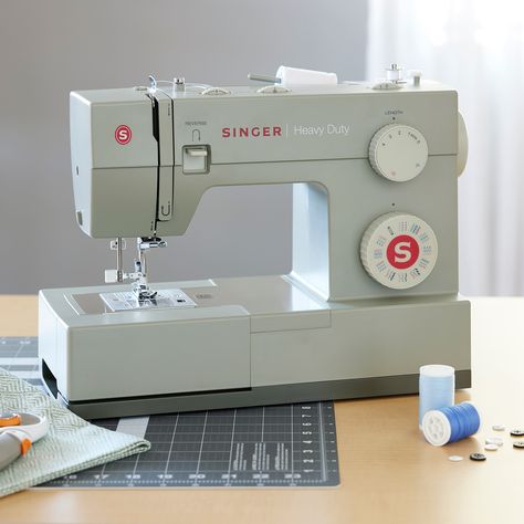 Purchase the Singer® M4452 Heavy Duty Sewing Machine at Michaels. A powerful motor for enhanced speed and piercing power make this SINGER Heavy Duty 4452 machine a true workhorse. The SINGER Heavy Duty 4452 sewing machine is designed with your heavy duty projects in mind, from denim to canvas. Thanks to the machine’s powerful motor, you have extra high sewing speed to save you time. With adjustable presser foot pressure, you can also sew very lightweight sheers, and the stainless steel bedplate Couture, Heavy Duty Sewing Machine, Sewing Aesthetic, Sawing Machine, Fashion Collection Inspiration, Sewing Machine For Sale, Fashion Dream Job, Sewing Machine Projects, Sewing Machine Reviews