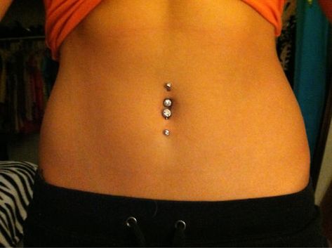 Everything you need to know about double belly button piercings, including: Pain, Aftercare, Healing Times, Risks, Infections, Jewellery & Example Images. Belly Button Piercing Double, Belly Button Piercing Care, Infected Belly Button, Double Navel Piercing, Double Belly Piercing, Least Painful Piercings, Belly Button Piercings, Snake Eyes Piercing, Eye Piercing