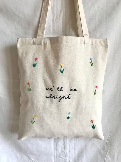 Embroidery tote bag embroidered personalised bags cool tumblr cute pinterest aesthetic ideas for gift flowers fiori ricamo a mano personalizzato borsa di cotone fine fine harry styles we’ll be alright Canvas Bag Ideas Design, Embroider Aesthetic, Tote Bag With Embroidery, Diy Canvas Bags, Embroidery Canvas Bag, Hand Embroidery Tote Bag, Canvas Bag Painting Ideas Easy, Embroidery Designs Tote Bag, Cute Tote Bags Aesthetic