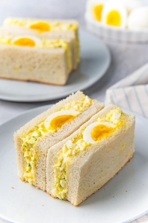 Japanese Egg Salad Sandwich - Soft sandwich bread filled with a creamy egg salad filling, with a jammy soft boiled egg. Simple to make, and delicious! #Breakfast #EggSaladSandwich #TheFlavorBender #JapaneseEggSandwich Japanese Egg Sandwich Recipe, Japanese Egg Salad Sandwich, Japanese Egg Sandwich, Japanese Egg Salad, Soft Sandwich Bread, Salad Filling, Creamy Egg Salad, Japanese Sandwich, Resep Sandwich