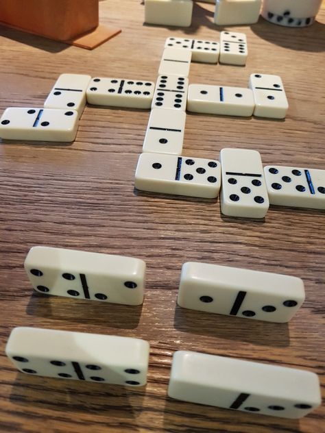 Dominoes Playing Domino Aesthetic, Dominoes Aesthetic, Dominos Game, How To Play Dominoes, Manama Bahrain, Game Night Parties, Simple Birthday Party, All Planets, Domino Effect