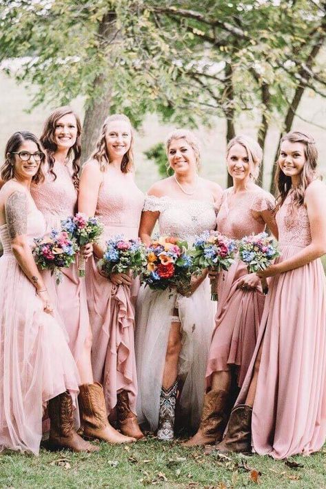 Cowboy boots and dusty rose bridesmaid dresses Bridesmaid Dresses With Cowgirl Boots, Bridal Party Cowboy Boots, Cowboy Boots Bridesmaids Long Dress, Long Bridesmaid Dresses With Boots, Bridesmaid Dresses Cowboy Boots, Cowboy Boot Bridesmaids, Bridesmaids With Boots, Cowboy Boots Bridesmaids, Country Bridesmaid Dresses With Boots Rustic Farm Wedding