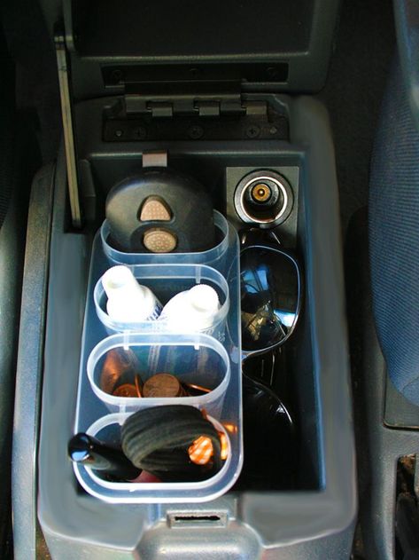 HGTV.com shares tips on how to organize your car with items you can find at the dollar store. Car Organization Diy, Car Console, Console Organization, Dollar Store Hacks, Makeup Organization Vanity, Car Essentials, Organizing Hacks, Vw Tiguan, Clean Your Car