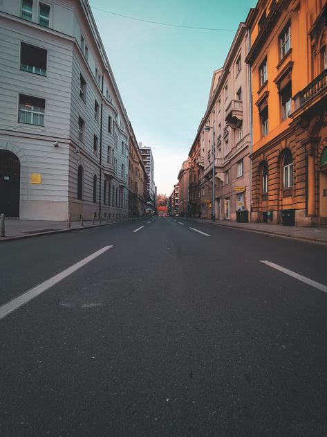 concrete road in middle of buildings during daytime photo – Free Building Image on Unsplash Roads Background, Editing Skills, Road