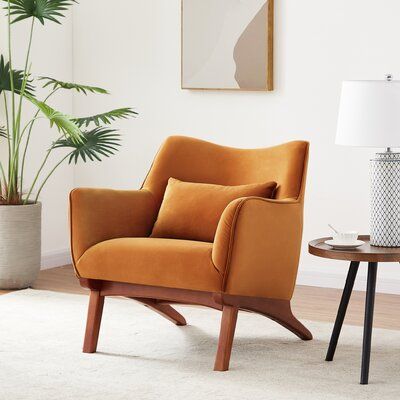 This armchair adds a mid-century modern design to your living room or den with its flared legs and tilted back. Its frame is made from solid rubberwood, and it's built on four flared angled wooden legs with a walnut finish. This 26" wide armchair is upholstered in velvet with a bright yellow hue that's sure to add a sunny look and lots of texture to your space. It's also filled with foam for cushioned support while you read or watch your favorite movie. Plus, we love that this sofa comes with al Velvet Lounge Chair, Mid Century Modern Lounge Chairs, Mod Furniture, Velvet Lounge, Lounge Chairs Living Room, Mid Century Modern Armchair, Modern Style Furniture, Luxury Chairs, Upholstered Armchair