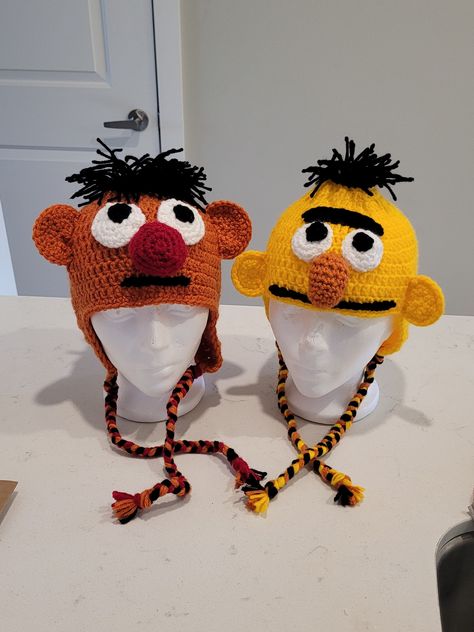 Beautiful handmade crochet Bert and Ernie Inspired crochet hats, made with love and 100% Acrylic yarn in a smoke free facility. Care Instructions Machine wash and lay flat to dry. Amigurumi Patterns, Crochet Halloween Hat, Ernie Und Bert, Disney Crochet, Bert And Ernie, Crochet Baby Photo Prop, Crochet Character Hats, Hats Crochet, Hats Winter