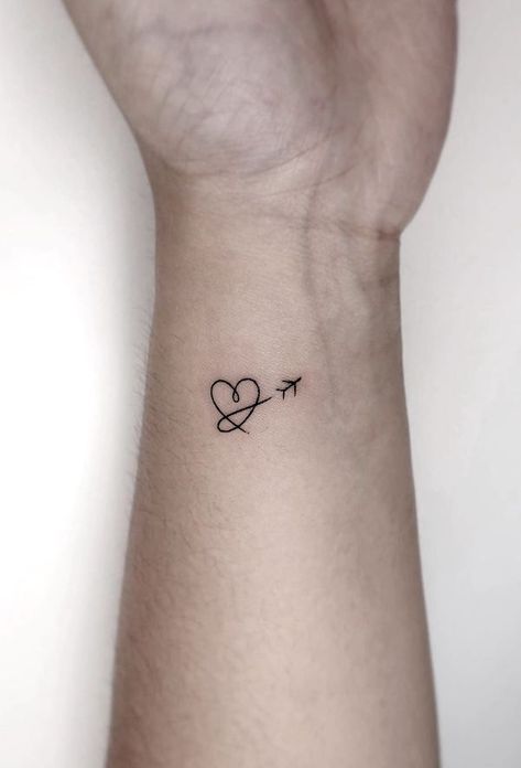 Small heart and plane tattoo by @nieun_tat2 Wave And Airplane Tattoo, Growth Tatoos, Fine Line Airplane Tattoo, Sun Heart Tattoo, Passport Tattoo, Small Travel Tattoo, Minimalist Tattoo Small, Plane Tattoo, Airplane Tattoo