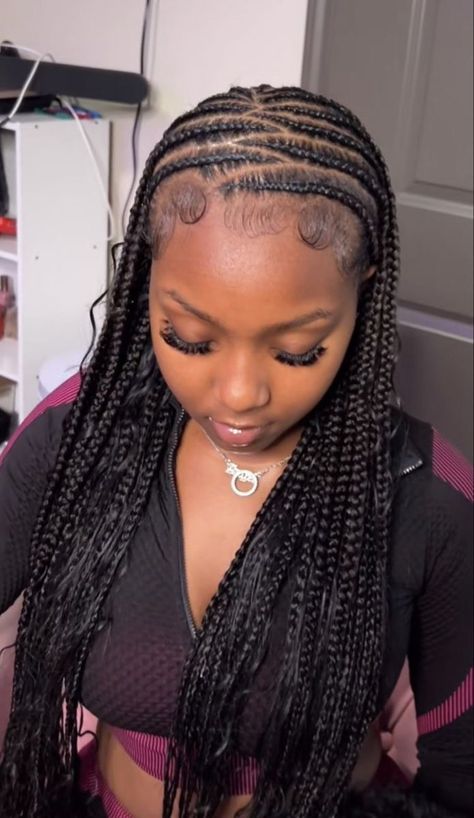 Whether you’re looking for a new way to style your own hair or seeking inspiration for a client, explore the top cornrow braid hairstyles. From classic styles to modern takes on the trend, there’s something for everyone. Fulani Braids Designs, 80s Haircuts, Zig Zag Braid, 80's Hairstyle, 1980s Hair, Short Box Braids Hairstyles, Twisted Hair, Braided Hairstyles For Teens, Quick Natural Hair Styles