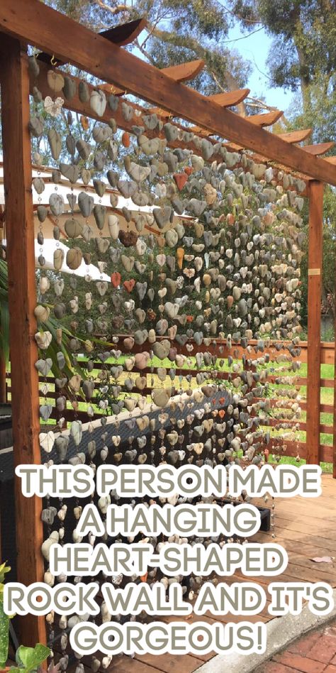 You Won't Believe This Stunning Heart-Shaped Rock Wall—See How They Made It! Rock Wall Display, Heart Rock Display Ideas, Heart Rock Garden, What To Do With Collected Rocks, Diy Rock Art Ideas, What To Do With Rocks You Collect, Diy Rock Wall Landscape, Diy Cabin Decor Ideas, Heart Shaped Rocks Ideas