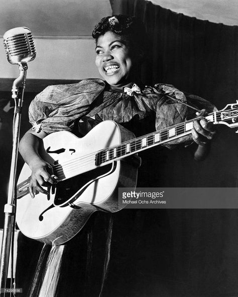 Sister Rosetta Tharpe performs onstage with the Lucky Millinder Orchestra in circa 1938. Sister Rosetta Tharpe, Rosetta Tharpe, 20th Century Music, Jerry Lee Lewis, Blues Musicians, Gospel Singer, Singing Career, Jerry Lewis, Billie Holiday