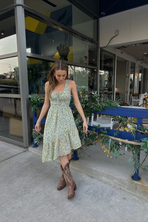 Dresses With Cowboy Boots Casual, Cowgirl Boot Skirt Outfit, Brown Cowboy Boots Dress Outfit, Dress And Country Boots Outfit, Midi Dress With Cowgirl Boots, Outfit Brown Cowboy Boots, Sun Dress With Cowgirl Boots, Sundress And Cowgirl Boots, Boots And Dress Outfit Summer