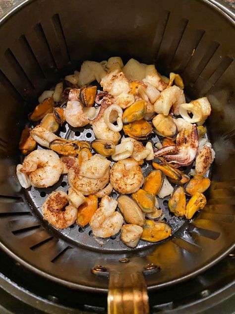 This air fryer seafood medley is amazing! Just put a bag of frozen seafood mix in the air fryer and it will cook it to perfection! Air fried seafood medley is so easy to make and so yummy, you'll love it! Octopus Recipes, Frozen Seafood Mix Recipes, Air Fryer Seafood, Seafood Medley Recipes, How To Cook Garlic, Mixed Seafood Recipe, Fried Seafood, Seafood Medley, Seafood Mix