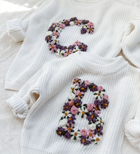 Hand Embroidered Baby Initial Sweater - Floral Monogram Sweater Message for customization & sweater, and yarn color availability! Patchwork, Embroidered Flower Letters Sweatshirt, Embroider Baby Sweater, Hand Embroidery Sweater, Sweater Embroidery Ideas, Embroidered Baby Sweater, Initial Sweater, Hand Embroidered Sweater, Baby African Clothes