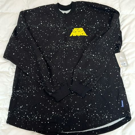 Nwt Long Sleeve Top Has All Over Starry Sky Print. The From Has The Star Wars Logo In Yellow, And The Back Shoulder Says “A Long Time Ago In A Galaxy Far Way.” Lettering Is Raised/Puffy.