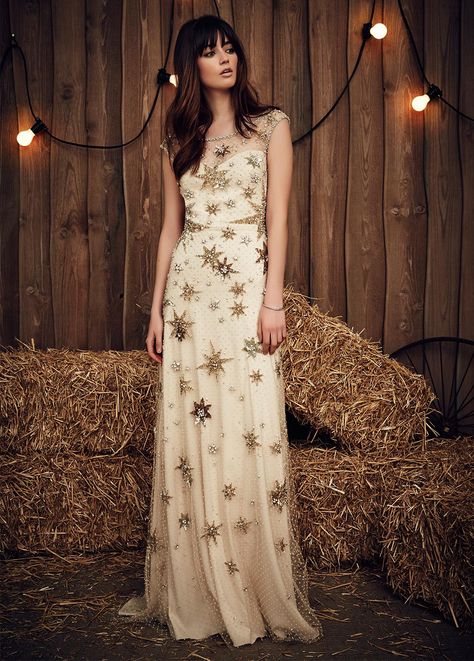 This star theme truly is out of this world and the colours are to die for. Neutral golds and browns are super flattering to any skin tone and the illusion neckline is a really feminine touch. This dress is completely adaptable to different wedding themes as the colours are warm and autumnal but the sparkle gives it that wintery touch. Jenny Packham, Jenny Packham Wedding Dresses, Jenny Packham Bridal, Unusual Wedding Dresses, Starry Night Wedding, فستان سهرة, Beauty Dress, Bridal Fashion Week, Wedding Dress Inspiration