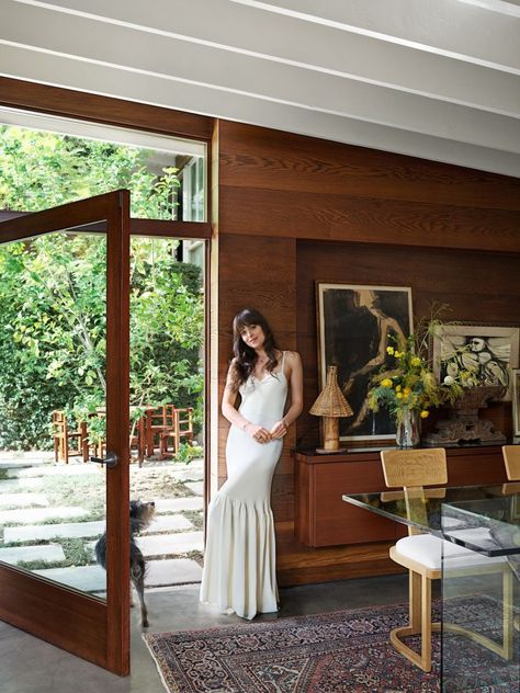 Visit Dakota Johnson’s Midcentury-Modern Home in LA by DLB Midcentury Wood Walls, Midcentury Modern Doors Interior, Organic Midcentury Modern Living Room, Nature Inspired Home Interior, Eclectic Mid Century Bedroom, Mis Century Modern House, Eclectic Mid Century Modern Bedroom, Dakota Johnson House, Mis Century Modern