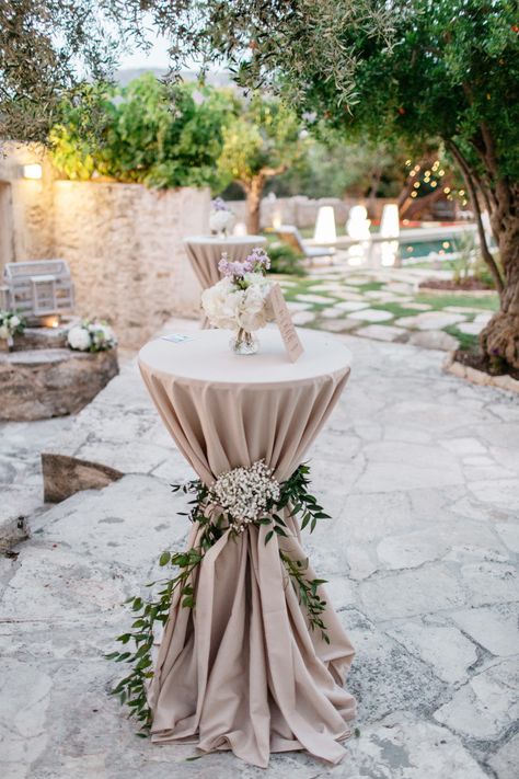 High tables can be decorated in a thousand ways, we love the rustic look with the long table cloth and flower decoration for this rustic Greek island wedding. Long Table Cloth, Wedding Cocktail Tables, Cocktail Table Decor, Greek Island Wedding, High Tables, Tafel Decor, Cocktail Reception, Outdoor Wedding Decorations, Long Table