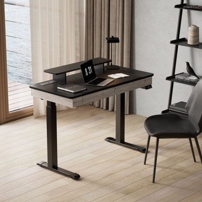 The height-adjustable desk with drawers and built-in USB ports creates a unique environment for gaming and working and provides a human-centered design and ample room for your work area. You can switch to different heights according to your posture to fully protect your neck, which makes your workday healthier. Size: 48" H x 47" W x 24" D, Color (Top/Frame): Light Brown | Eureka Ergonomic Height Adjust Electric Standing Desk Wood / Metal in White / Brown | 47 W x 24 D in | Wayfair Standing Desk Setup Aesthetic, Custom Standing Desk, Adjustable Desk Home Office, Electric Sit Stand Desk, Height Adjustable Desk, Office Table Design, Office Interior Design Modern, Desk White, Home Office Furniture Desk