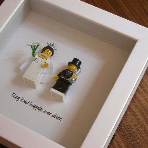 Art frame feature two LEGO®️️ minifigures, Bride and Groom with the a quote: ‘They lived happily ever after beneath. Its the perfect gift for Card Box Wedding Diy, Lego Wedding, Homemade Wedding Gifts, Wedding Gifts For Bride And Groom, Diy Wedding Gifts, Homemade Wedding, Wedding Engagement Gifts, Best Wedding Gifts, Married Couples