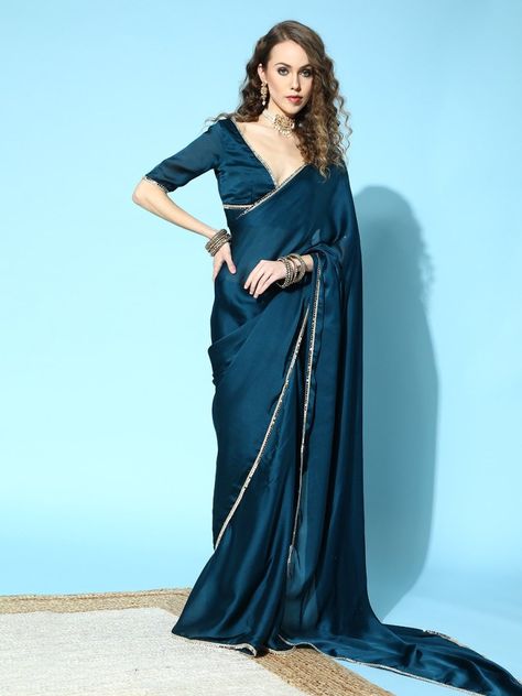 Marvellous teal satin festive wear saree online for women which is crafted from satin fabric and comes with satin blouse. Blouse Designs Satin Saree, Satin Saree With Border, Blouse Design For Satin Saree, Plain Satin Saree With Designer Blouse, Satin Saree Styling, Satin Blouse Designs For Saree, Plain Saree Look, Satin Saree Blouse Designs, Satin Saree Look