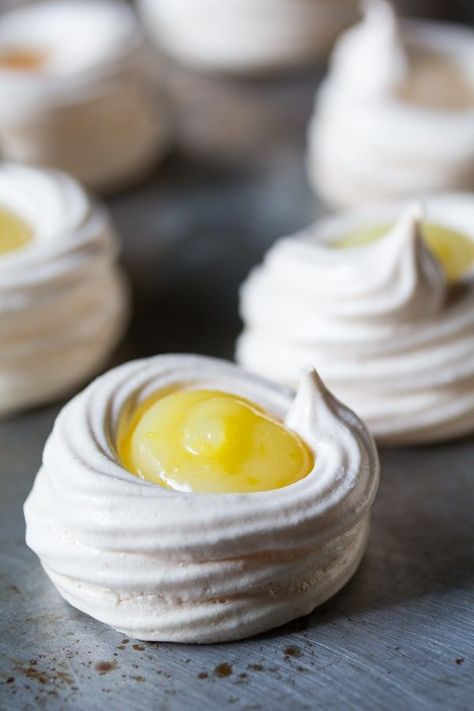 Lemon meringue pie bites are a light, lemony dessert that is gluten-free! Mini meringue nests are filled with lemon curd. #sweetpeasandsaffron #glutenfree #pie #cookie #meringue #dessert #spring #summer #easter Mini Desserts, Pie Bites, Lemon Meringue Pie, Small Desserts, Meringue Pie, Lemon Desserts, Lemon Meringue, Lemon Recipes, Lemon Curd