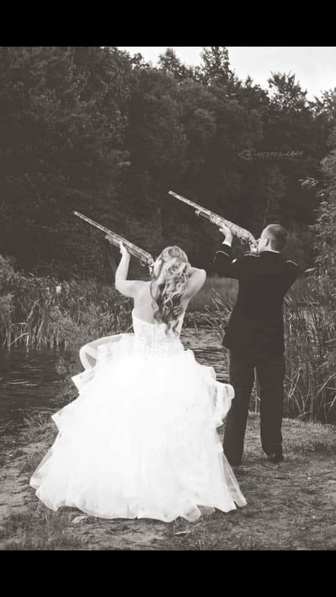 black and white wedding photo, women in big puffy white wedding gown shooting a camo patterned shotgun with male groom in black tuxedo shooting a camo patterned shotgun Ely, Country Wedding Pictures Ideas, Outdoor Wedding Ideas Country, Fall Country Dress, Southern Theme Wedding, Cowboy And Cowgirl Wedding Ideas, Country Theme Wedding Dresses, Wedding Country Dresses, Wedding Dresses Country Western