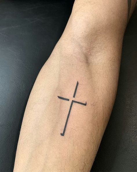 Minimalistic Hand Tattoos: Celebrating Style and Symbolism for Men 2023 - mens-club.online Original Tattoos Men, Cross For Men Tattoo, Men Tattoo Ideas Christian, Cross Simple Tattoo, Tatoos Men Arm Small Simple, Simple Cross Tattoo For Men, Minimalist Men Tattoo, Small Cross Tattoo For Men, Mens Rib Tattoo Ideas