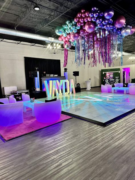 Vayda’s sweet 16 | CatchMyParty.com Dance Theme Party Ideas, Diy Light Up Dance Floor, Disco Dance Decor, Dance Party Birthday Ideas, Sweet 16 Disco Theme, Dance Theme Birthday Party, Iridescent Decor Party, Sweet 16 Neon Party Ideas, Disco Sweet 16 Party