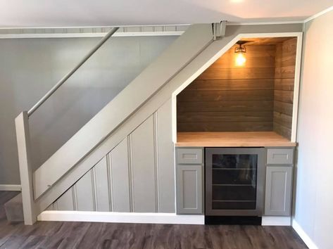 How To Open Up Basement Stairs, Small Basement Set Up Ideas, Basement Ideas With Stairs In The Middle, Diy Basement Living Room Ideas, Condo Basement Ideas, Small Basement Stairs, Small Basement Wall Ideas, Pole In Basement Ideas, Wallpaper Stairwell Basement