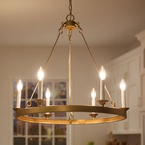 Elegant and understated, this timeless 6-Light Candle Style Wagon Wheel Chandelier metal chandelier adds character to any living room or dining room. Mid Century Modern Gold Chandelier, Round Chandelier Dining Room, Gold Chandeliers Dining Room, Candle Ceiling, Modern Gold Chandelier, Chandelier Candle, Lighting Dining Room, Mid Century Modern Chandelier, White Candle Sticks