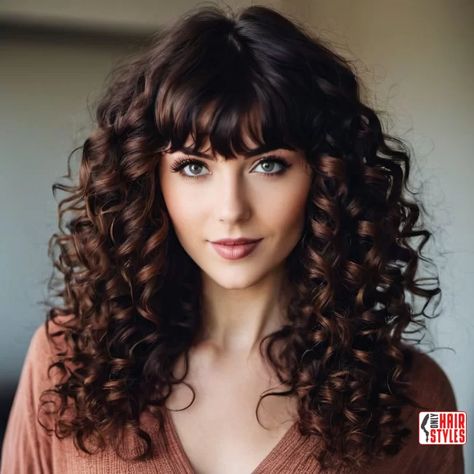 1. Long Curly Hair with Bangs | 60 Best Curly Hairstyles With Bangs For A Stunning Look! Welcome to the world of irresistible curls and chic bangs! If you're ready to embrace a bold and beautiful transformation, you've come to the right place. In this comprehensive guide, we'll navigate the exciting realm of curly hairstyles with bangs, showcasing the 60 best. Fringe For Curly Hair, Perm With Bangs Long Hair, Straight Fringe Curly Hair, Long Hair Perm With Bangs, Curly Hairstyles With Straight Bangs, Big Curls With Bangs, Long Curly Hair With Straight Bangs, Naturally Curly Hair Bangs, Long Curly Hair With Side Bangs