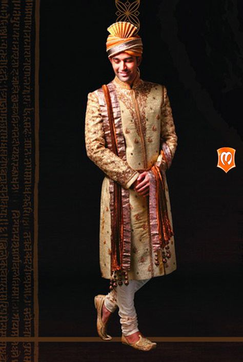 The Manyavar silk embroidered sherwani :- This sherwani weaved on silk with the wedding brown shade is an icon of impact on the grand day. Sequin arrangemment, thread work and creative design of intricate threads makes it the pick of the wardrobe.  #Sherwani #Manyavar #Wedding #Ethnic Wear #Manyavar Wedding Wear #Indian Wedding Wear #Wedding Collection #Manyavar Sherwani Manyavar Sherwani, Wedding Wear Indian, Marriage Poses, Sherwani Wedding, Wedding Brown, Indian Bride Poses, Indian Bride Photography Poses, Embroidered Sherwani, Sherwani For Men Wedding